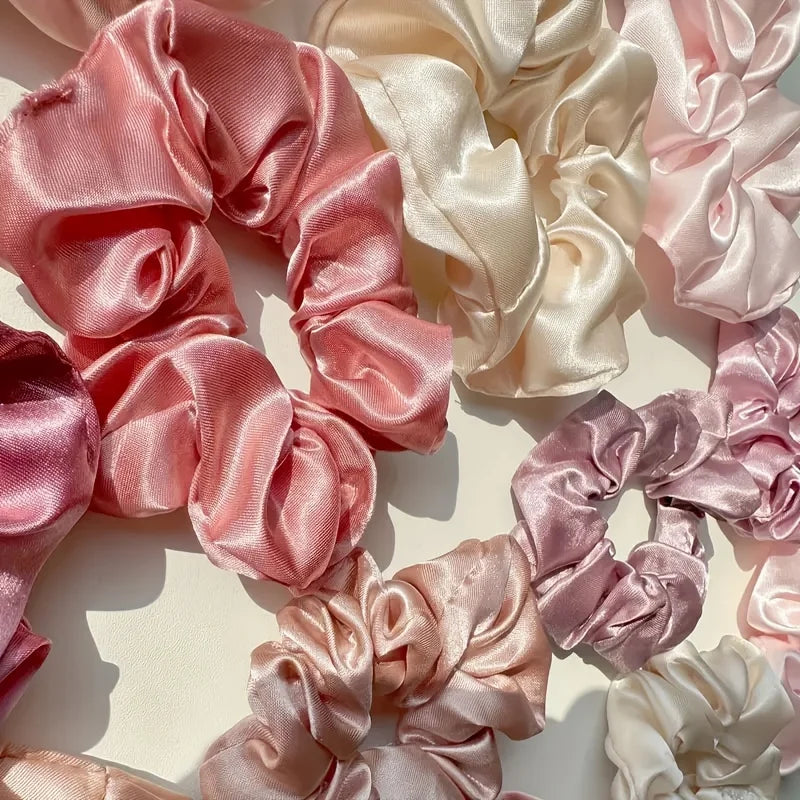 16-piece set of soft satin hair ties in pink and brown colors |